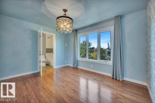 Large window and hardwood floors. Looking to 5-pc ensuite. - 895 Lee Ridge Road Nw, Edmonton, AB 
