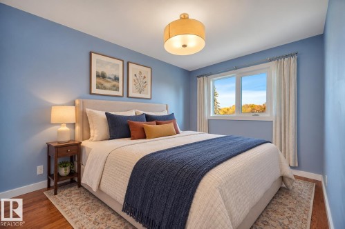 Bedroom 3. NE exposure. Hardwood floors. Virtually staged for inspiration. - 895 Lee Ridge Road Nw, Edmonton, AB 