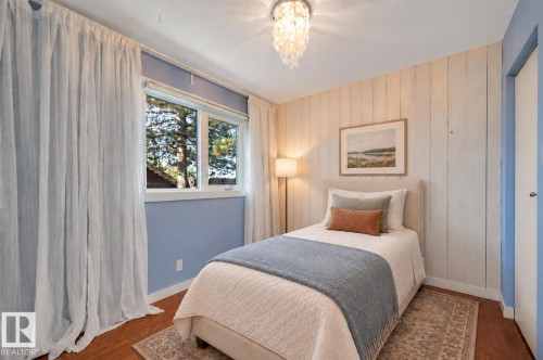 Main floor bedroom #4. SW exposure. Hardwood floors. Virtually staged for inspiration. - 895 Lee Ridge Road Nw, Edmonton, AB 