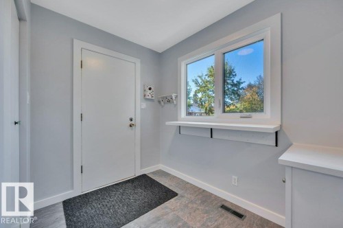 To backyard. Built-in cabinet and closet storage - 895 Lee Ridge Road Nw, Edmonton, AB 