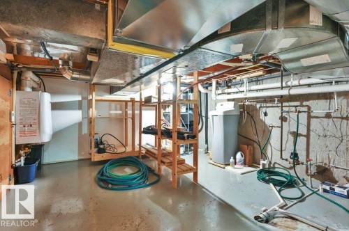 Water softener, on-demand hot water heater, built-in vacuum, furnace + additional storage - 895 Lee Ridge Road Nw, Edmonton, AB 