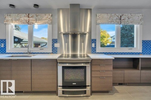 With large windows and stainless steel appliances - 895 Lee Ridge Road Nw, Edmonton, AB 