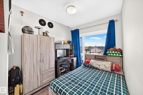 Window with a residential neighborhood backdrop - #404 12804 140 Av Nw, Edmonton, AB 