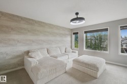Accent wall featuring horizontal wood-finish planks - 