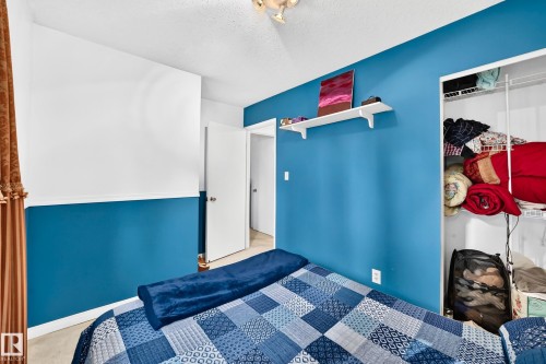 Built-in open shelving within closet - 11007 173A Avenue Nw, Edmonton, AB 