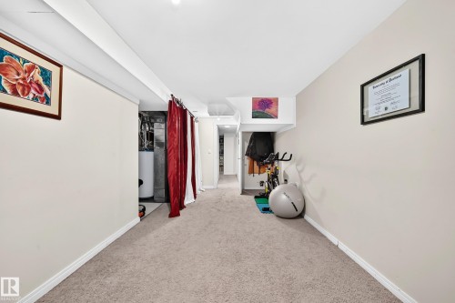 Carpeted flooring, neutral wall tones, and recessed ceiling lighting - 11007 173A Avenue Nw, Edmonton, AB 