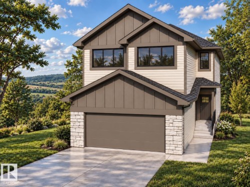 Contemporary exterior featuring light-colored siding, dark trim accents, stone facade detailing, an attached garage, and a concrete driveway - 28 Brickyard View, Stony Plain, AB 