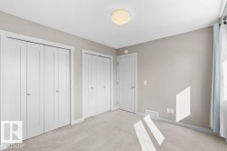 Wall-to-wall carpeting with light gray paint throughout - 