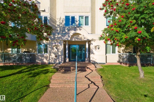 Paved walkway with integrated steps leading to the main entrance - #408 10610 76 St Nw, Edmonton, AB 