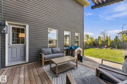 Wood-finish deck with a fenced yard and exterior wall siding - 