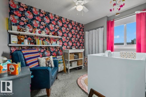 Textured carpeting throughout - 1040 Lakewood Rd N Nw, Edmonton, AB 