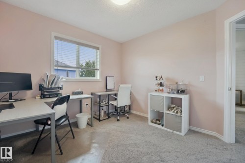 Carpeted flooring, window with blinds, and neutral painted walls - 324 Ascott Crescent, Sherwood Park, AB 