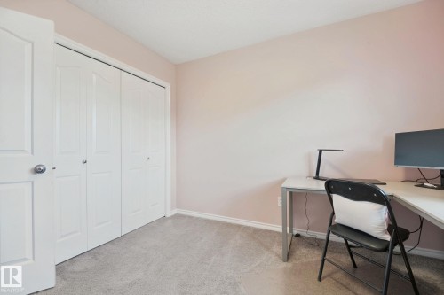 Neutral wall color, light gray carpet, and white trim - 324 Ascott Crescent, Sherwood Park, AB 