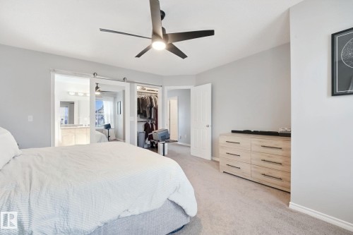 Carpeted flooring, contemporary ceiling fan, and light gray wall paint - 324 Ascott Crescent, Sherwood Park, AB 