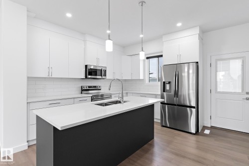 #UPPER 6630 46 AV , Beaumont, AB T4X 2Z4 4