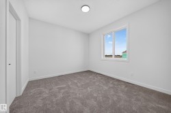 Wall-to-wall carpeting with a light gray finish - 