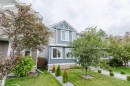 Two-story residence featuring light blue and gray siding with white trim - 6717 Elston Lane Nw, Edmonton, AB 