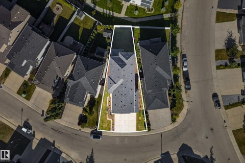 Aerial perspective highlighting the property boundaries, a paved driveway, and a shingled roof - 11010 174A Avenue Nw, Edmonton, AB 