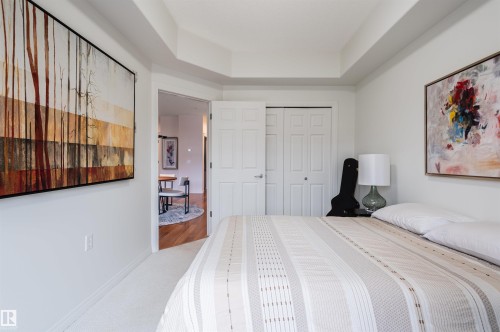 Tray ceiling, carpet flooring, bi-fold closet doors, and interior door with hardware - #230 45 Inglewood Dr, St. Albert, AB 