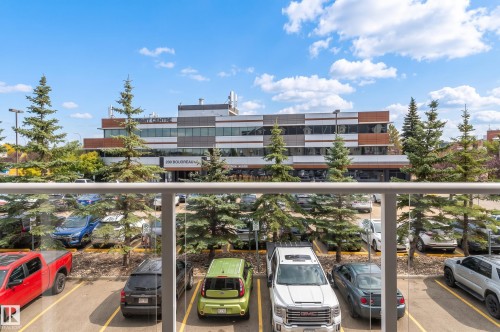 Glass balcony railing with white top rail - #230 45 Inglewood Dr, St. Albert, AB 