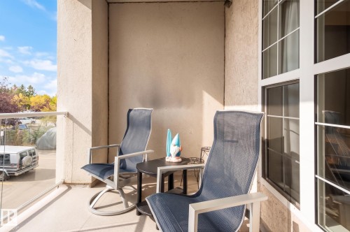 Private balcony featuring a concrete floor, stucco walls, and a clear panel railing - #230 45 Inglewood Dr, St. Albert, AB 