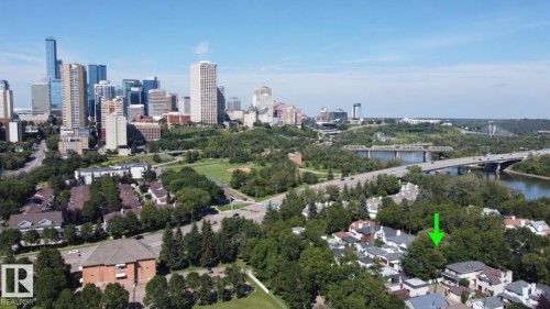 Urban skyline backdrop with river and bridge structures - 9628 100A Street Nw, Edmonton, AB 
