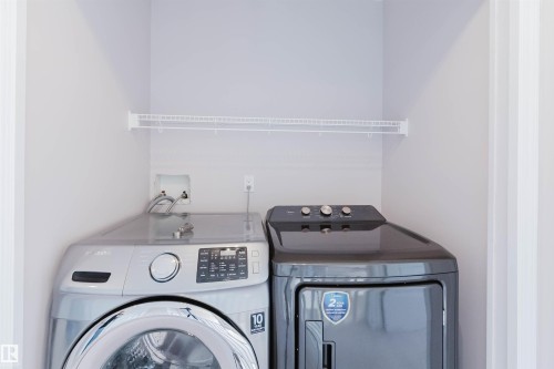 Laundry area featuring a wire shelf - 11526 9 Avenue Nw, Edmonton, AB 