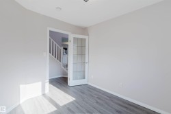 Wood-finish flooring with light-toned walls - 