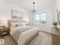 Recessed lighting, wood-finish flooring, a contemporary ceiling fixture, and a large sliding window - 