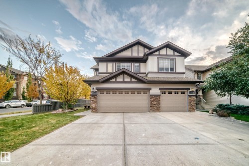 Two-story residence featuring a two-car garage and an additional single-car garage - 1673 Cunningham Way Sw, Edmonton, AB 