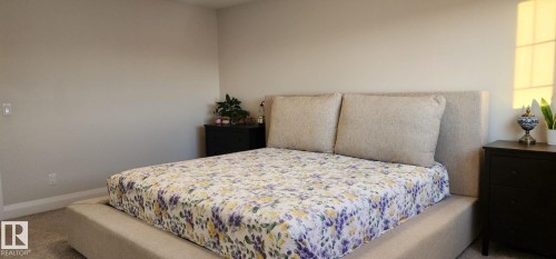 Carpeted flooring with light-toned wall paint - 3779 Cherry Loop Sw, Edmonton, AB 