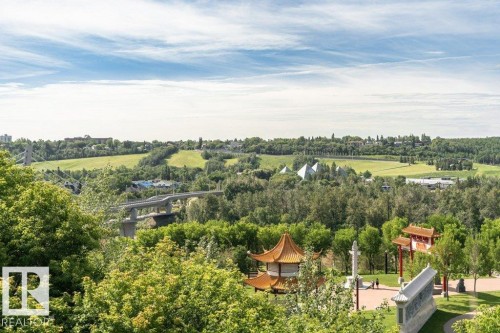 Expansive parkland with mature trees, green spaces, and distinct architectural structures - #202 9503 101 Av Nw, Edmonton, AB 