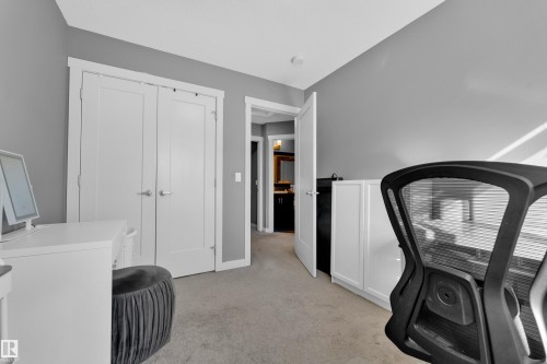 Neutral gray walls, white trim, and light gray carpeting - #22 4205 30 St Nw, Edmonton, AB 