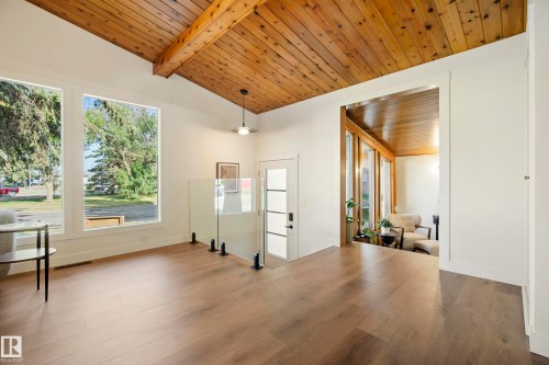Vaulted wood-paneled ceiling with exposed beams - 10316 42 Street Nw, Edmonton, AB 