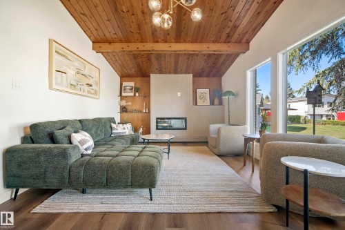 Vaulted wood-paneled ceiling with exposed beams - 10316 42 Street Nw, Edmonton, AB 