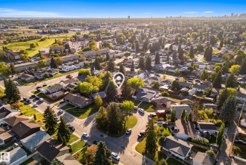 Aerial view showcasing residential neighborhood with mature trees and suburban streets - 10316 42 Street Nw, Edmonton, AB 