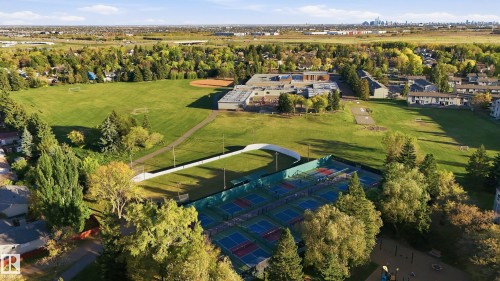 Expansive green space featuring multiple sports fields, tennis courts, and mature trees - 74 Aspen Crescent, St. Albert, AB 