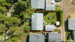 Gable roof structure with a detached auxiliary building - 