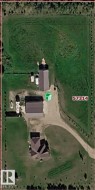 Aerial Property View. Illustrating the property's layout, structures, and surrounding land parcels, with the postal code 57314 visible - 