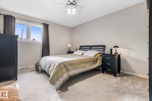 Recessed window with white trim, light-colored wall paint, and overhead ceiling fan with integrated lighting - 4103 44 Avenue, Stony Plain, AB 