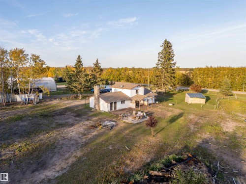 Expansive property featuring a detached residence, multiple accessory structures, and extensive grounds - 62202 Rr 444, Rural Bonnyville M.D., AB 