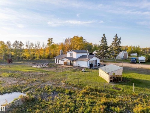 White exterior with contrasting dark roof - 62202 Rr 444, Rural Bonnyville M.D., AB 