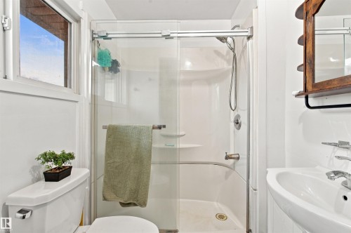 White pedestal sink with chrome faucet - 62202 Rr 444, Rural Bonnyville M.D., AB 
