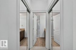 Mirrored sliding closet doors with crown molding - 