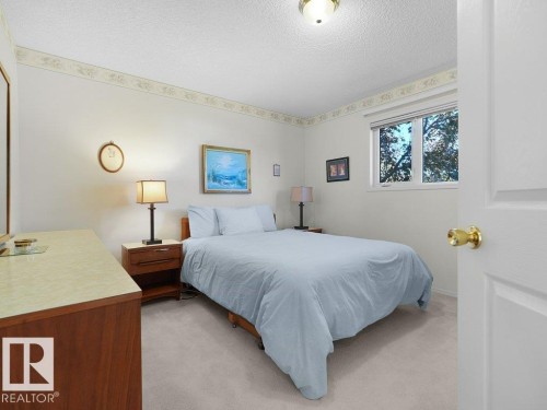 2nd bedroom located on the upper floor. - 156 Phillips Row Nw, Edmonton, AB 