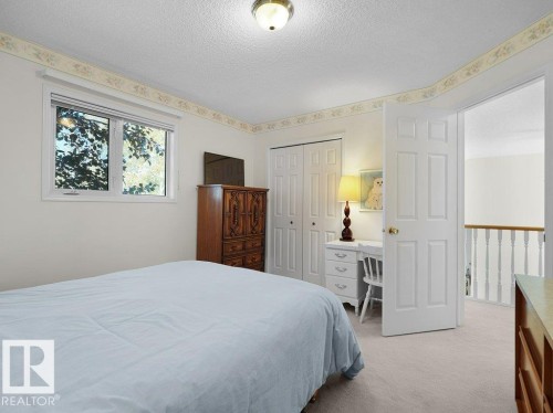 Wall-to-wall carpeting and white paneled doors - 156 Phillips Row Nw, Edmonton, AB 