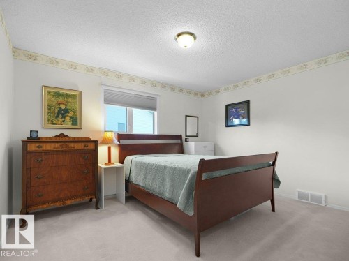 Thid bedroom located on the upper floor. - 156 Phillips Row Nw, Edmonton, AB 
