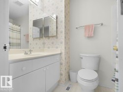 Located on the upper level. 4 pce. guest bathroom. - 