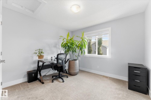 Recessed lighting, wall-mounted light fixture, light-colored carpeting, white window trim, and a white ceiling hatch - #15 4835 Wright Dr Sw, Edmonton, AB 
