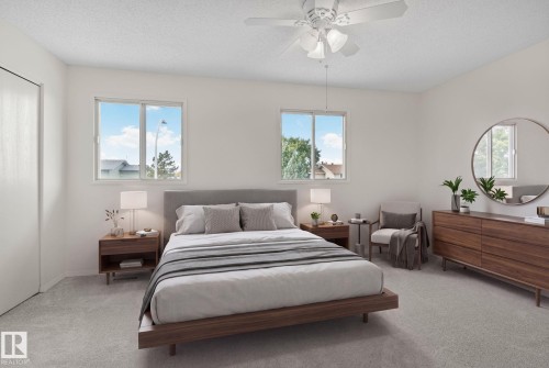 Neutral wall tones with soft carpeting - 14411 23 Street Nw, Edmonton, AB 